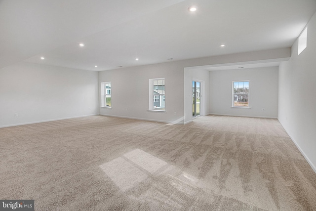 empty room featuring light colored carpet