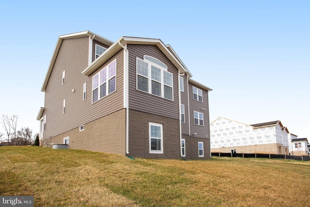 view of property exterior featuring a yard