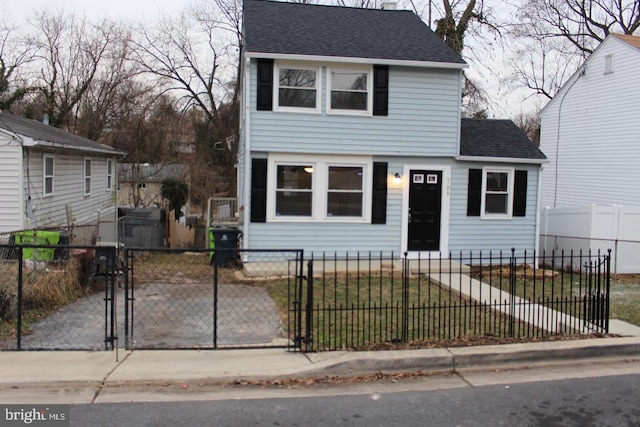 front facade with a front lawn