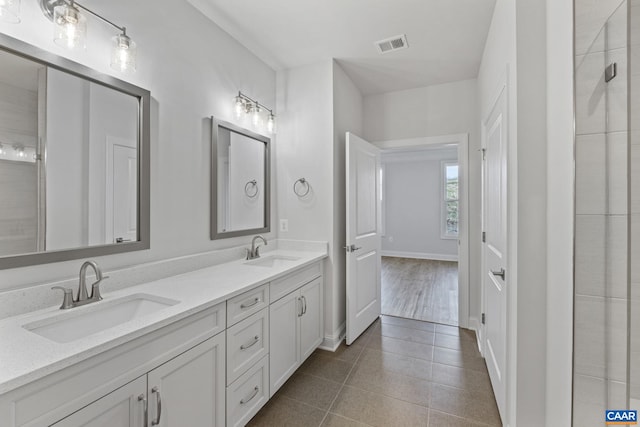 bathroom featuring tile patterned floors and vanity