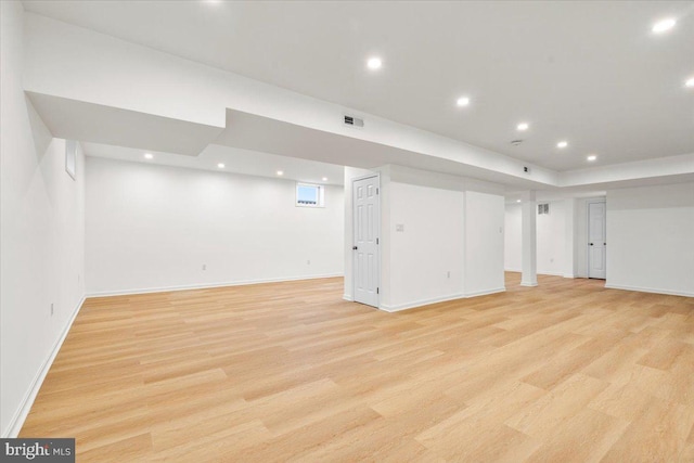 basement with light wood-type flooring