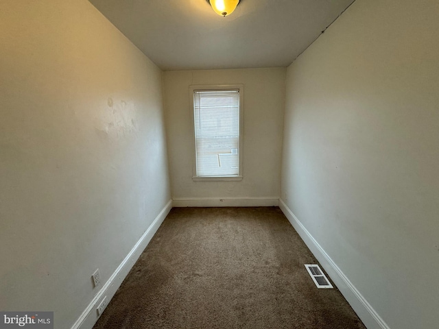 spare room with carpet flooring