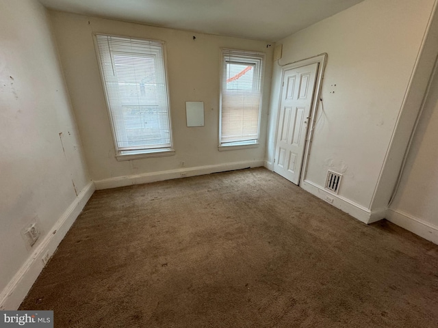 view of carpeted spare room