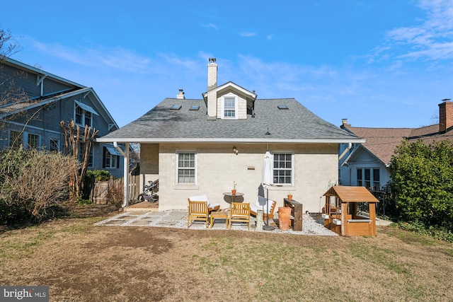 rear view of property featuring an outdoor living space, a patio area, and a yard