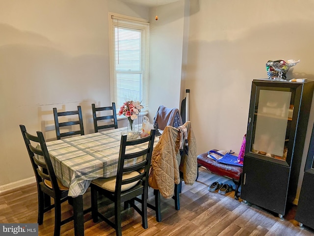 dining area featuring hardwood / wood-style floors