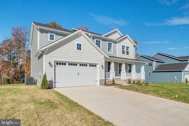 view of front of home with covered porch, a garage, a front yard, and central AC