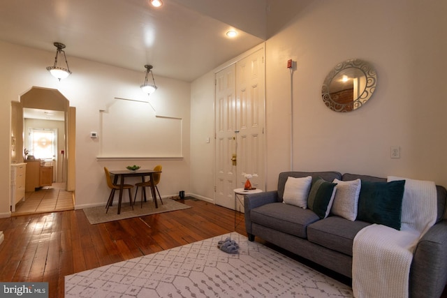 living room with light hardwood / wood-style flooring