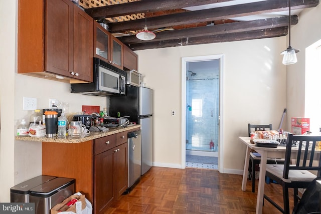 kitchen featuring hanging light fixtures, light stone counters, dark parquet floors, stainless steel dishwasher, and beamed ceiling