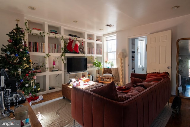 living room with parquet flooring