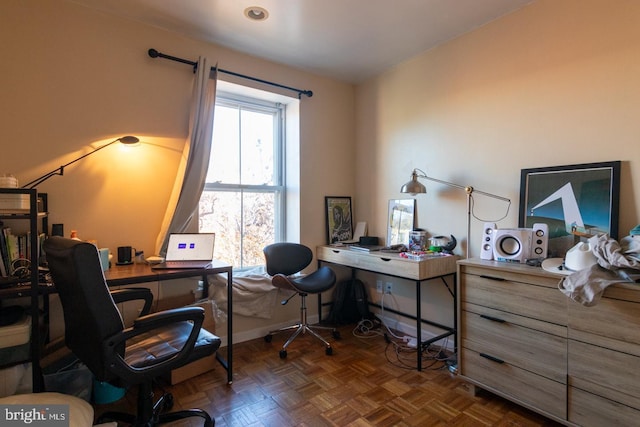 office area with dark parquet flooring