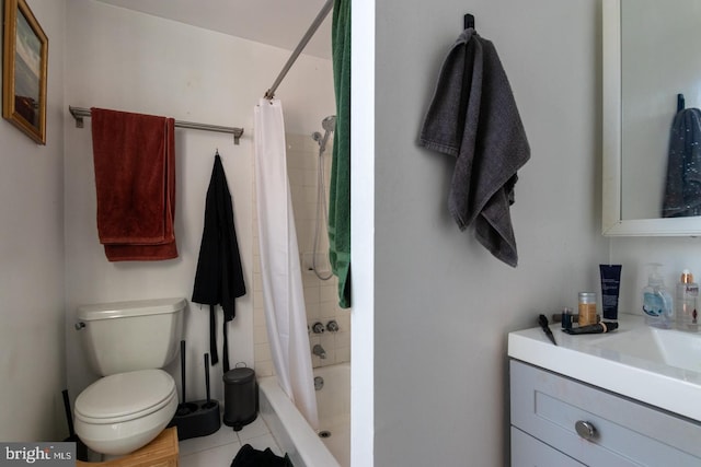 full bathroom with vanity, shower / bath combo, tile patterned floors, and toilet