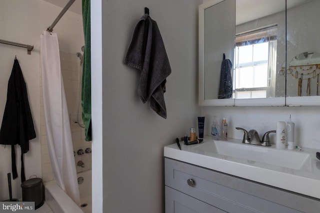 bathroom with vanity and shower / bath combo