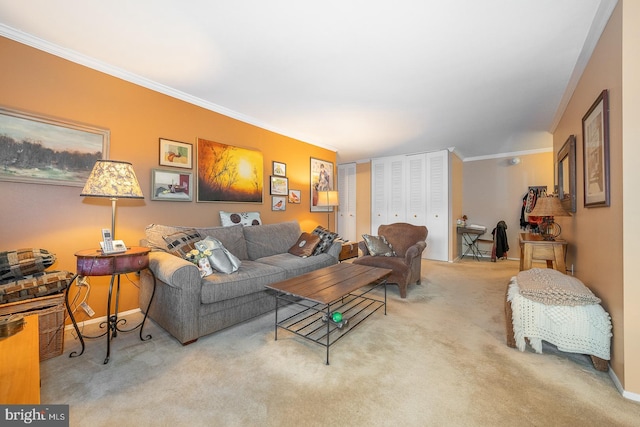 carpeted living room featuring ornamental molding