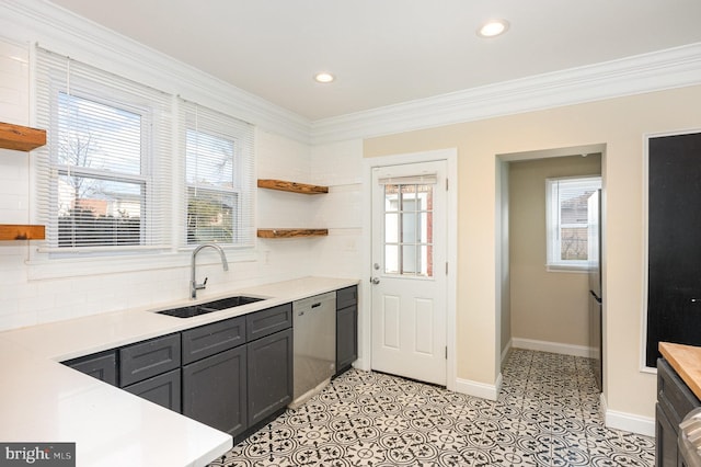 kitchen featuring dishwasher, backsplash, sink, ornamental molding, and light tile patterned floors