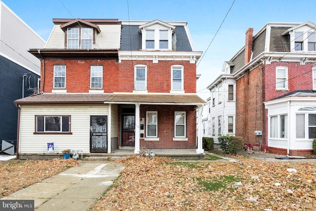 view of front of home featuring covered porch