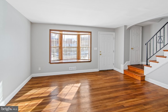 entrance foyer featuring hardwood / wood-style floors