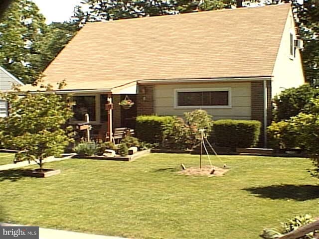 view of front of home with a front yard