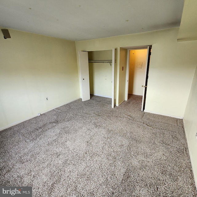 unfurnished bedroom featuring carpet floors