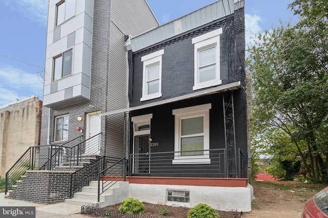 view of front facade featuring covered porch