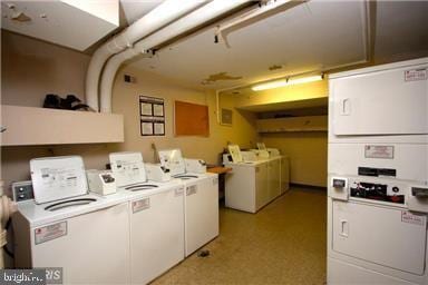 washroom with washer and dryer