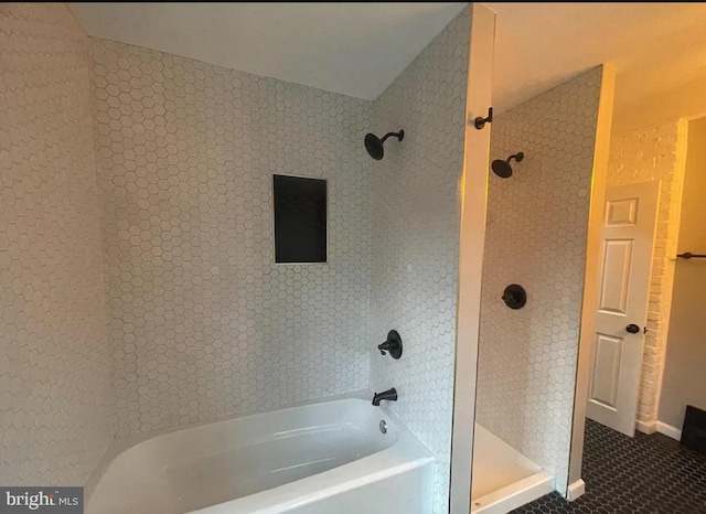 bathroom with tile patterned floors and independent shower and bath