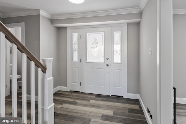 entryway with hardwood / wood-style floors and crown molding