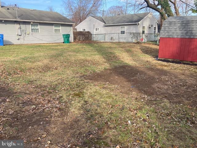 view of yard with a storage shed