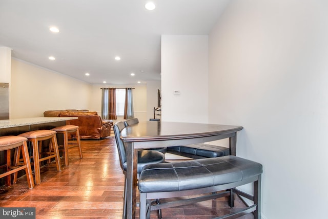 dining area featuring hardwood / wood-style flooring