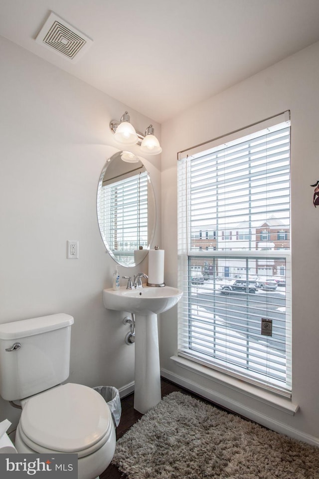 bathroom featuring toilet