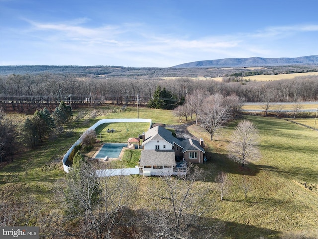 aerial view with a mountain view and a rural view