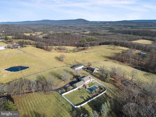 bird's eye view featuring a mountain view and a rural view