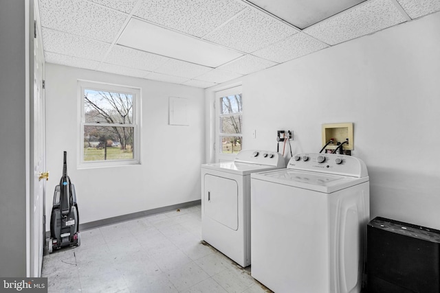 laundry area with independent washer and dryer