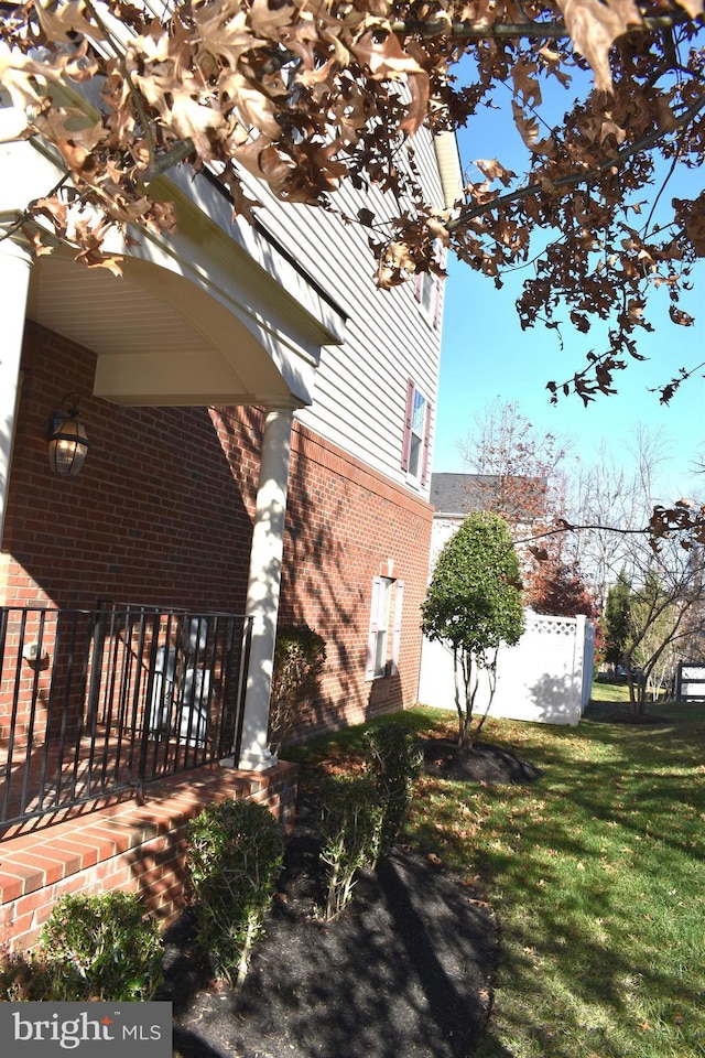 view of home's exterior featuring a lawn