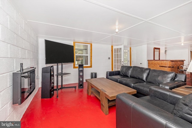 living room featuring concrete floors