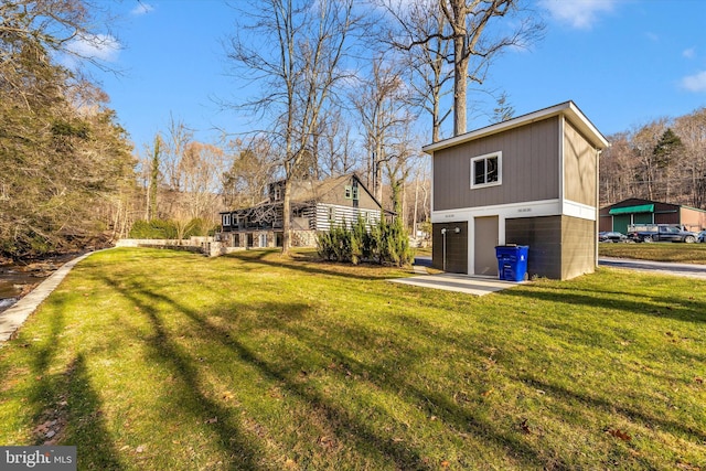 view of yard with a garage