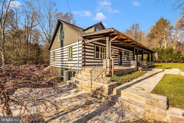 6131 Mountaindale Rd, Thurmont, MD 21788 - view of property exterior with log exterior and a porch