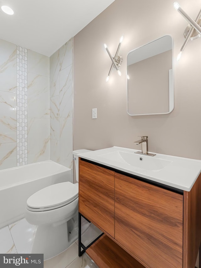 full bathroom featuring vanity, toilet, and tiled shower / bath combo