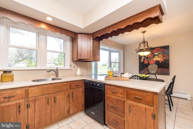 kitchen with kitchen peninsula, sink, decorative light fixtures, a baseboard radiator, and dishwasher