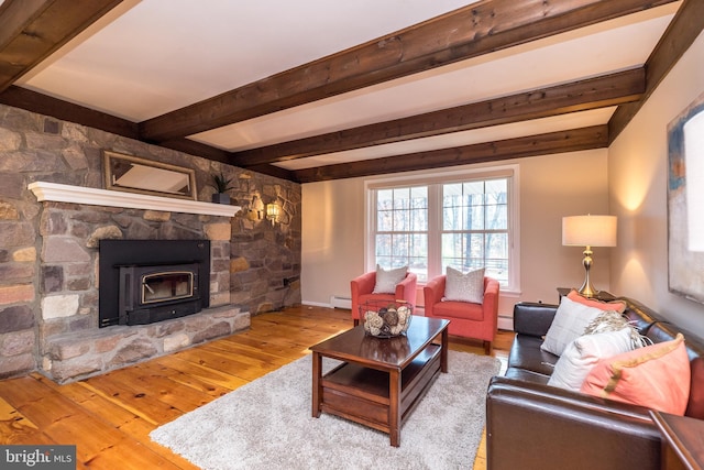 living room featuring beam ceiling, hardwood / wood-style floors, and a baseboard radiator