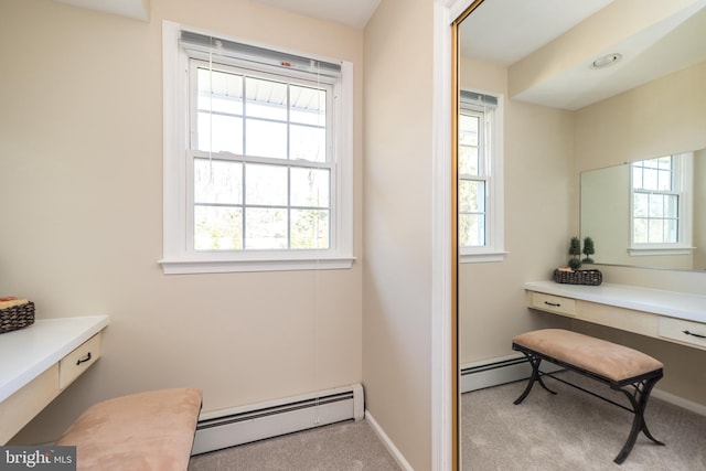 bathroom with a baseboard radiator