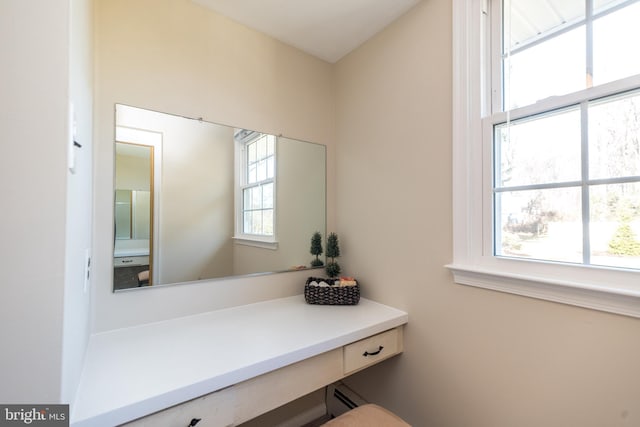 bathroom with a baseboard radiator