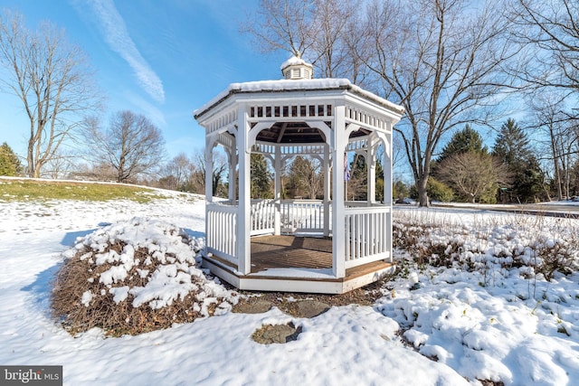 snow covered deck with a gazebo