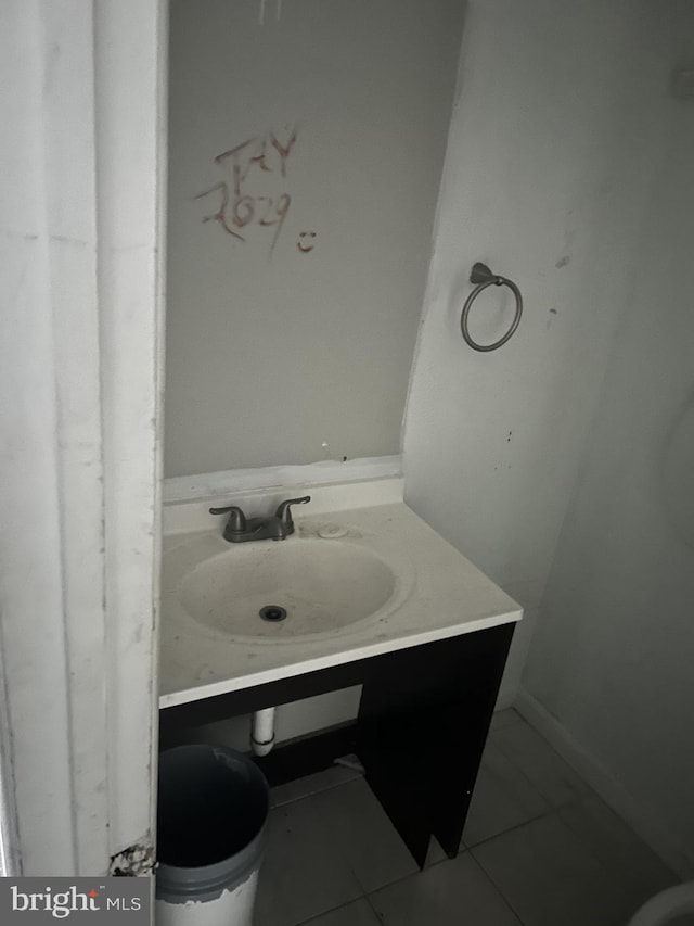 bathroom featuring tile patterned floors and vanity