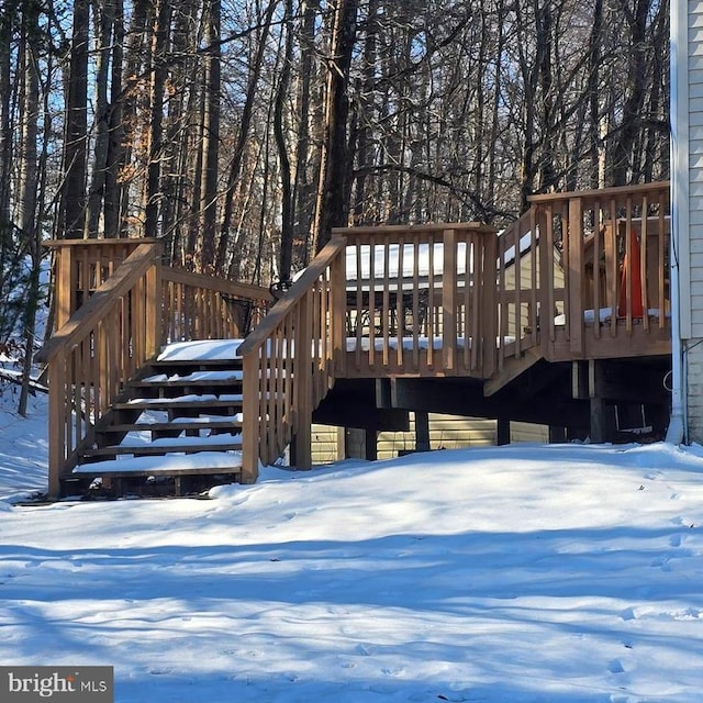 view of snow covered deck