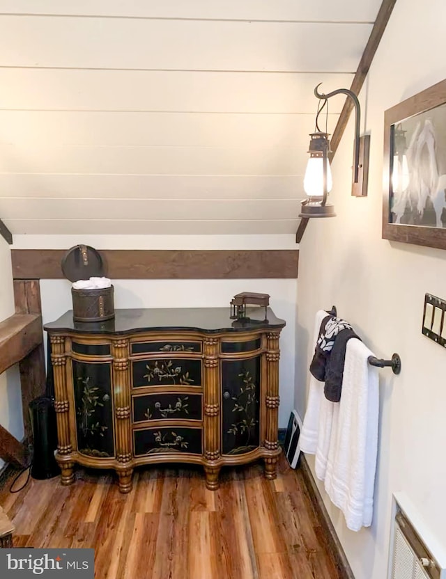 bar featuring dark hardwood / wood-style floors