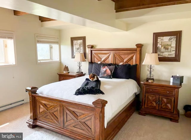 bedroom with beamed ceiling, light colored carpet, and a baseboard radiator