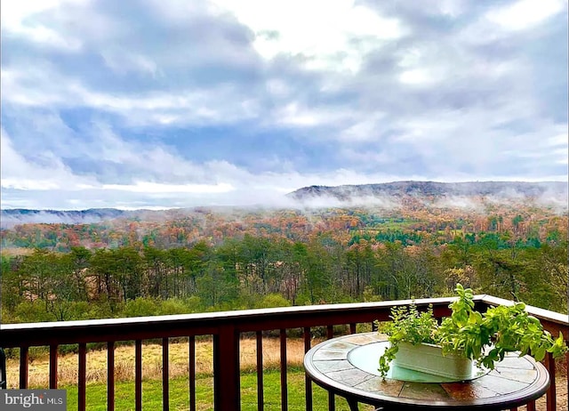 balcony featuring a mountain view