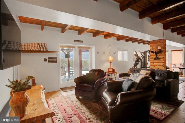 living room featuring beam ceiling, wooden ceiling, and light tile patterned flooring