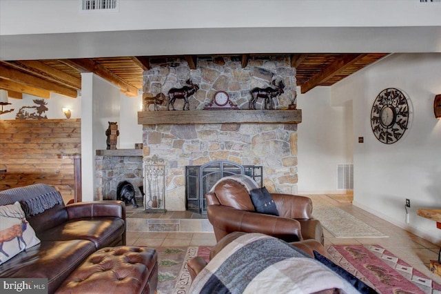 living room featuring a fireplace, beam ceiling, and wood ceiling