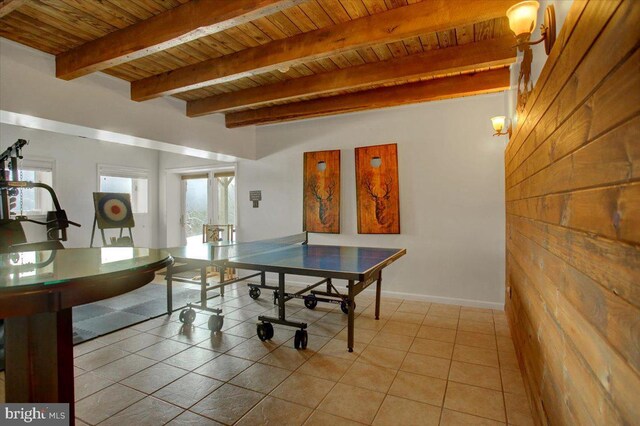 recreation room with light tile patterned flooring, beamed ceiling, and wood ceiling